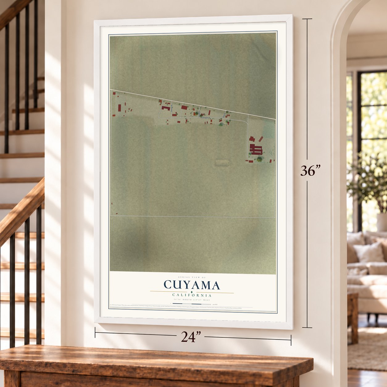 Cuyama, California map, 24 x 36 inch print in a white frame by a staircase