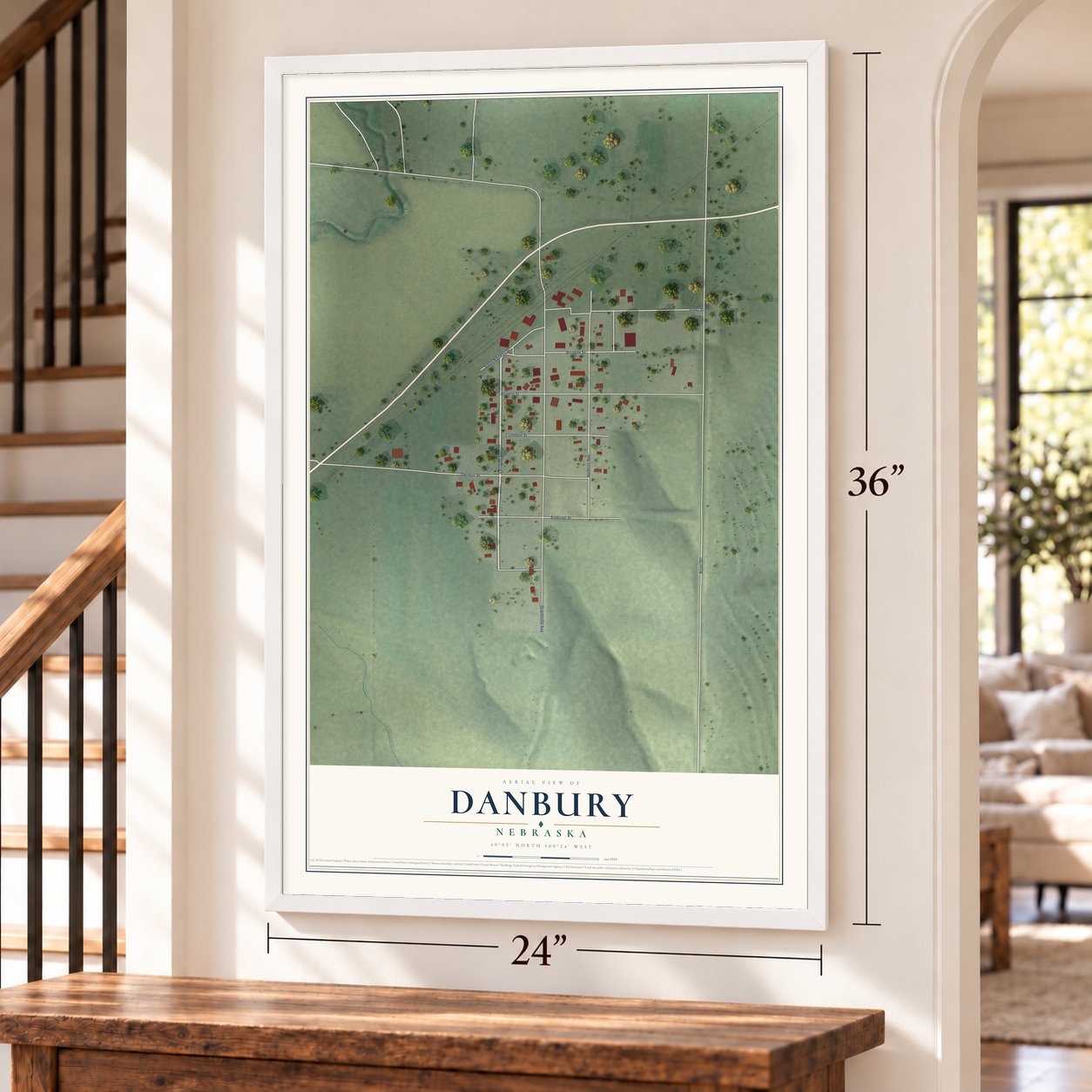 Danbury, Nebraska map, 24 x 36 inch print in a white frame by a staircase