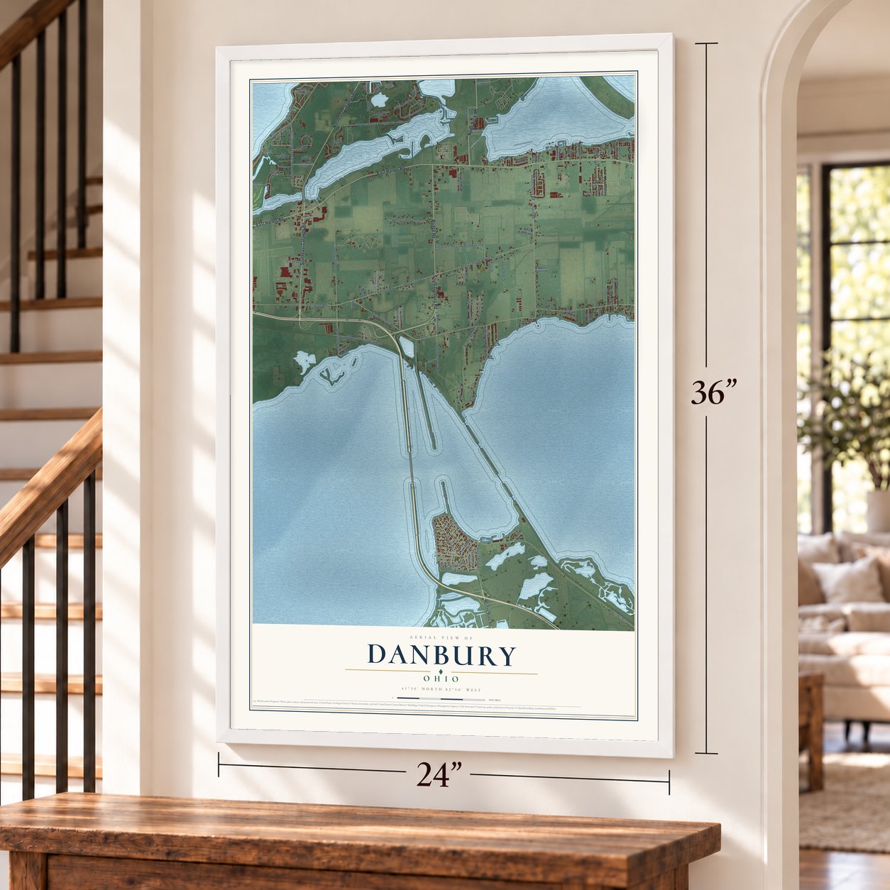 Danbury, Ohio map, 24 x 36 inch print in a white frame by a staircase