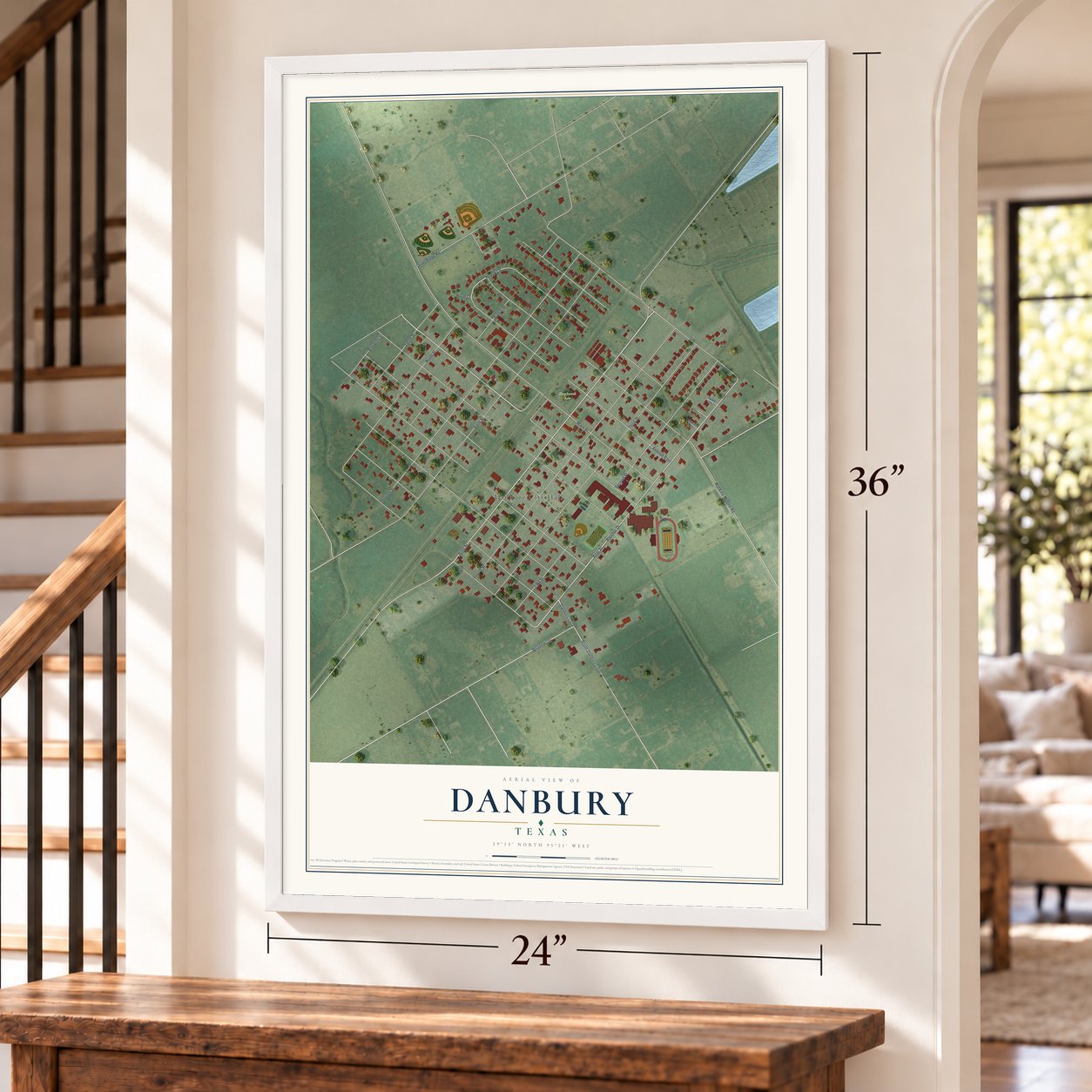 Danbury, Texas map, 24 x 36 inch print in a white frame by a staircase