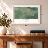 Danbury, Wisconsin map, 12 x 18 inch print in a white frame in an entryway