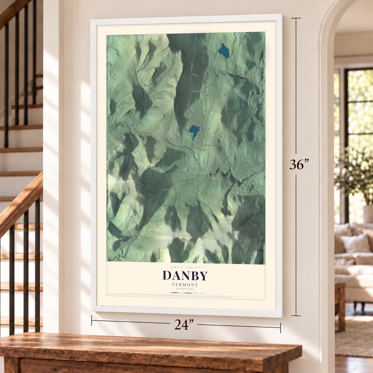 Danby, Vermont map, 24 x 36 inch print in a white frame by a staircase