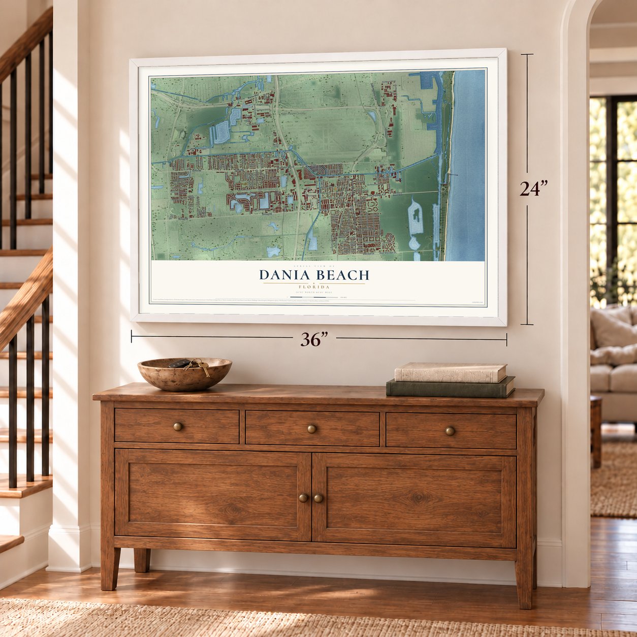 Dania Beach, Florida map, 24 x 36 inch print in a white frame above a dresser by a staircase