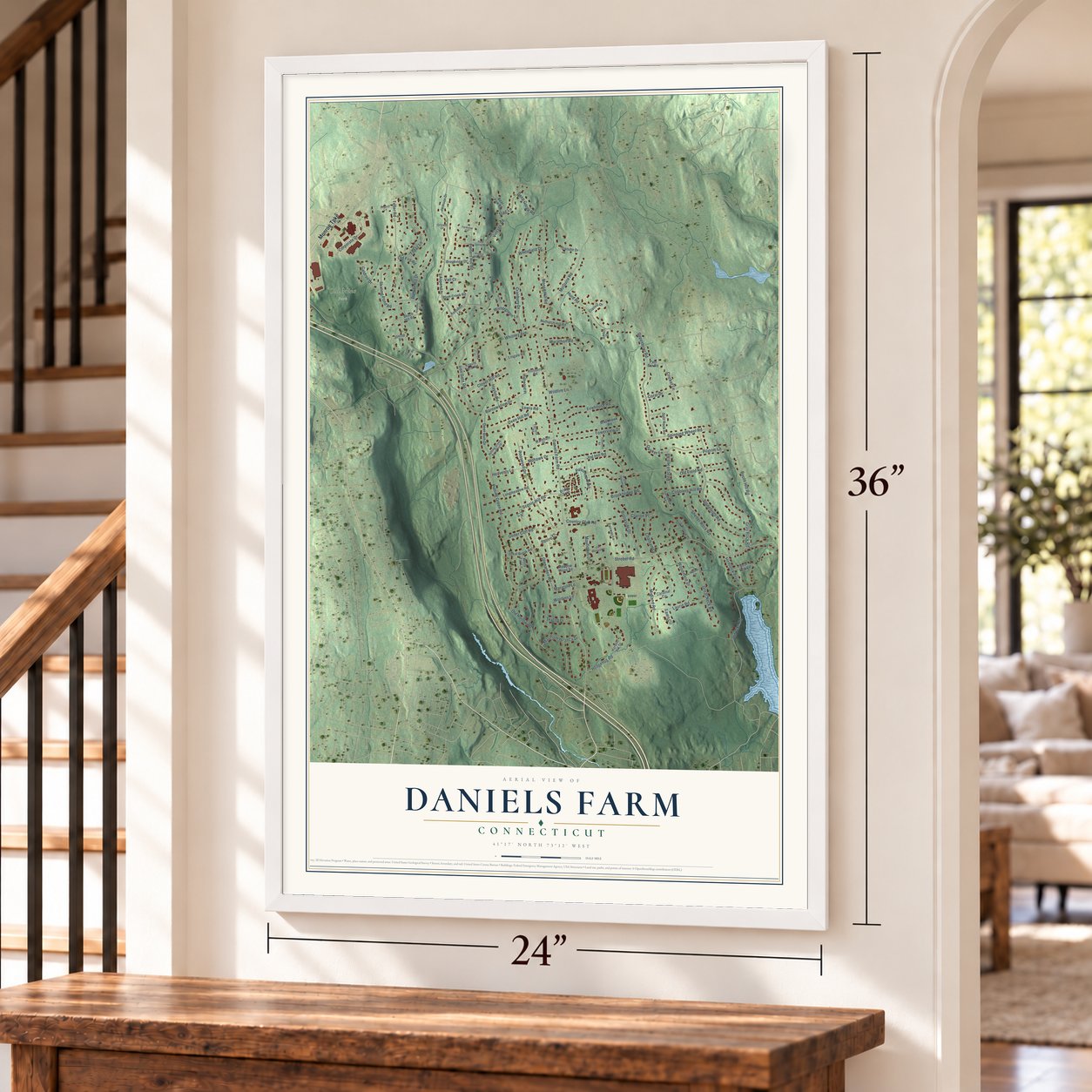 Daniels Farm, Connecticut map, 24 x 36 inch print in a white frame by a staircase