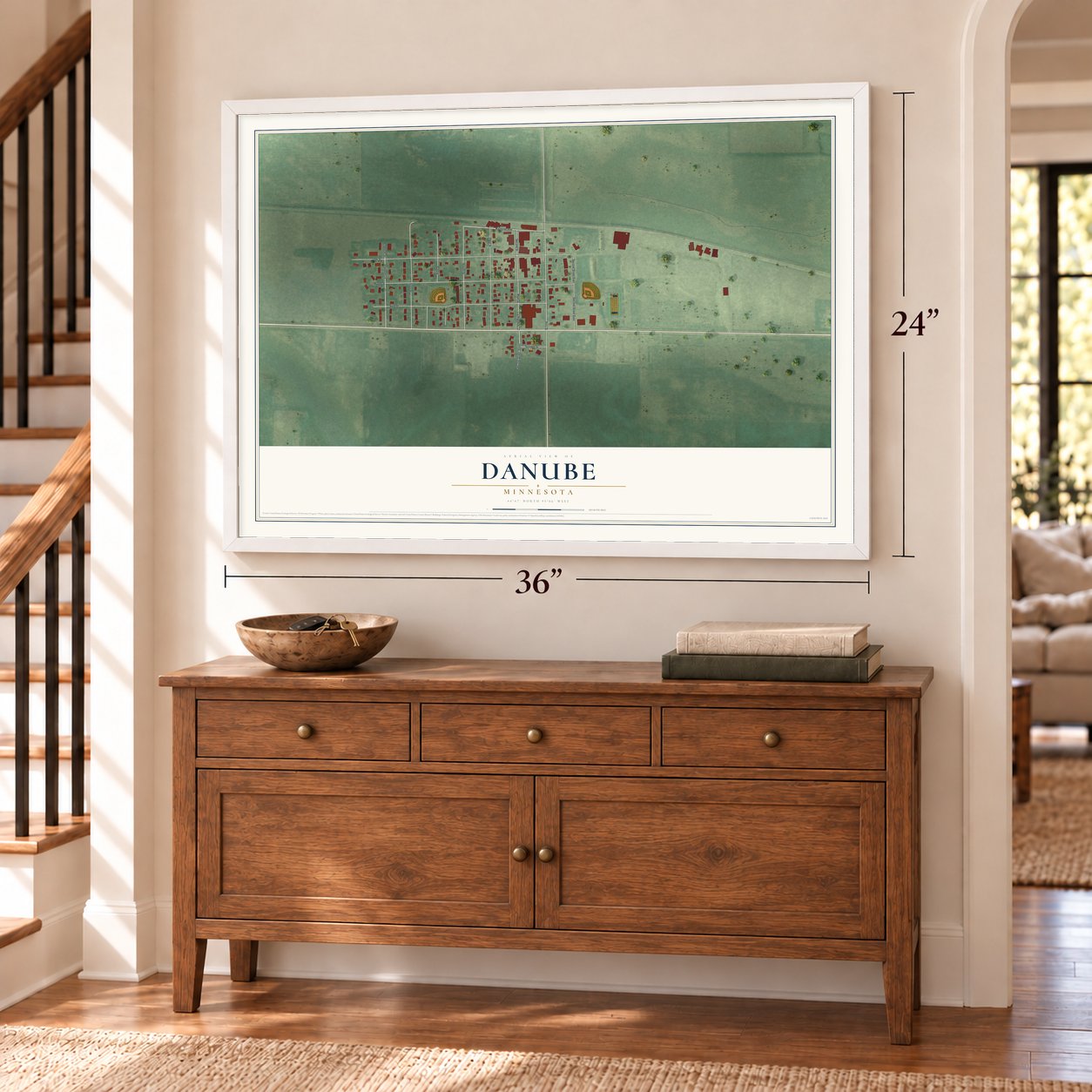 Danube, Minnesota map, 24 x 36 inch print in a white frame above a dresser by a staircase