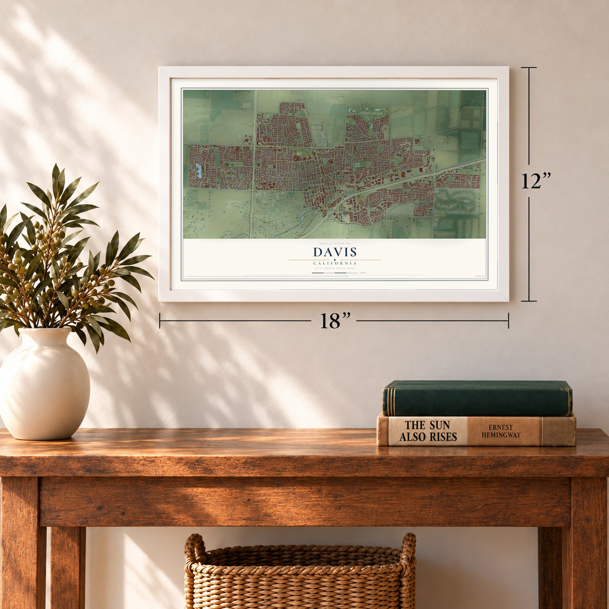 Davis, California map, 12 x 18 inch print in a white frame in an entryway
