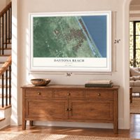 Daytona Beach, Florida map, 24 x 36 inch print in a white frame above a dresser by a staircase