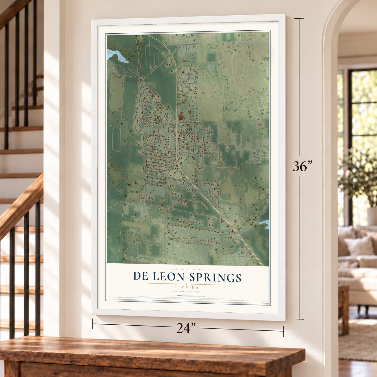De Leon Springs, Florida map, 24 x 36 inch print in a white frame by a staircase