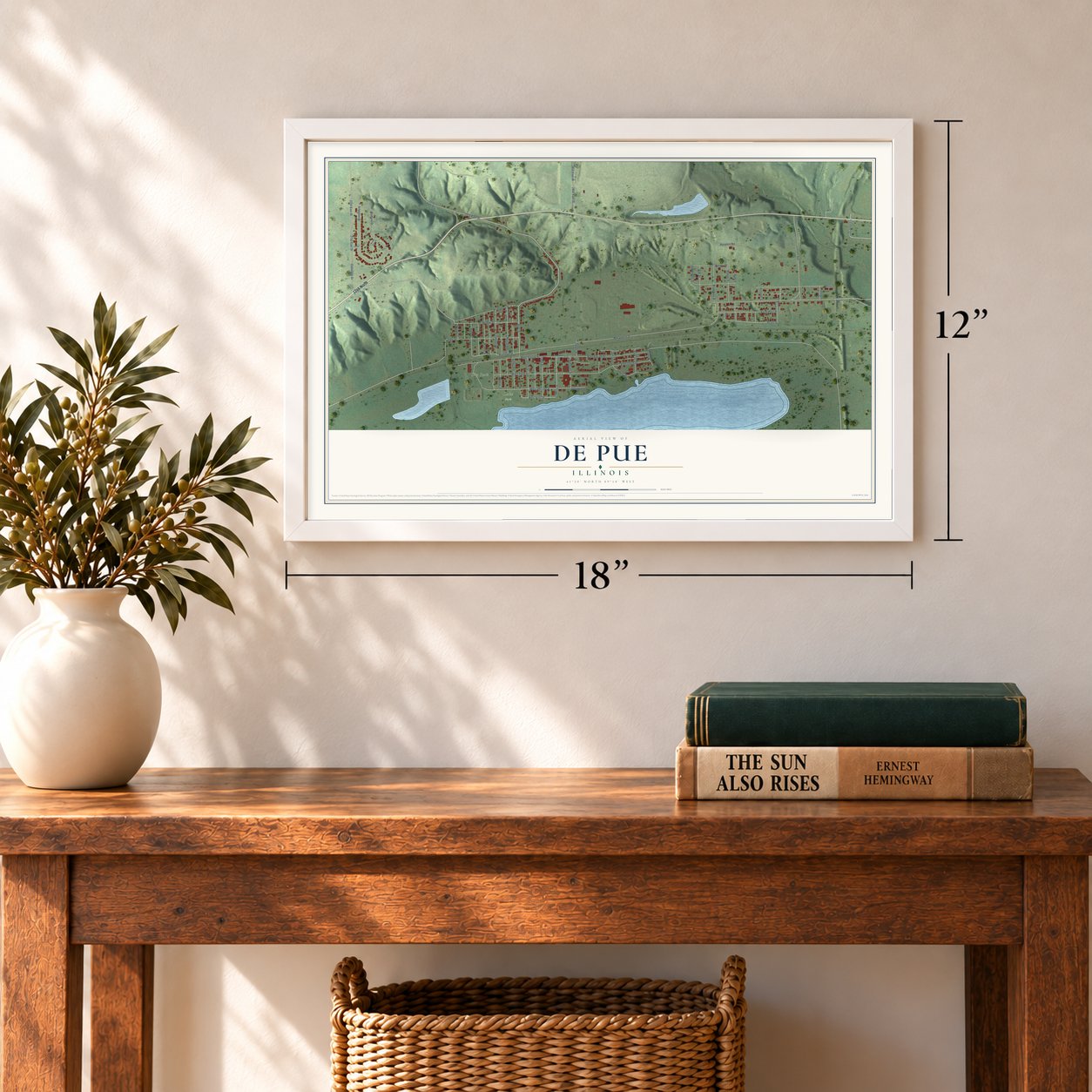 De Pue, Illinois map, 12 x 18 inch print in a white frame in an entryway