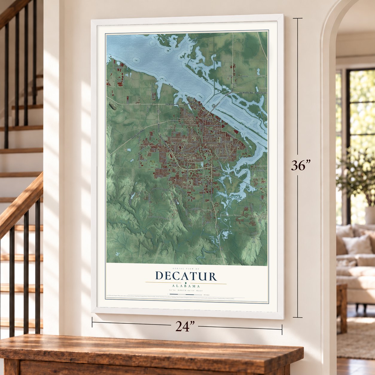Decatur, Alabama map, 24 x 36 inch print in a white frame by a staircase