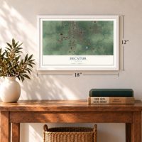 Decatur, Indiana map, 12 x 18 inch print in a white frame in an entryway