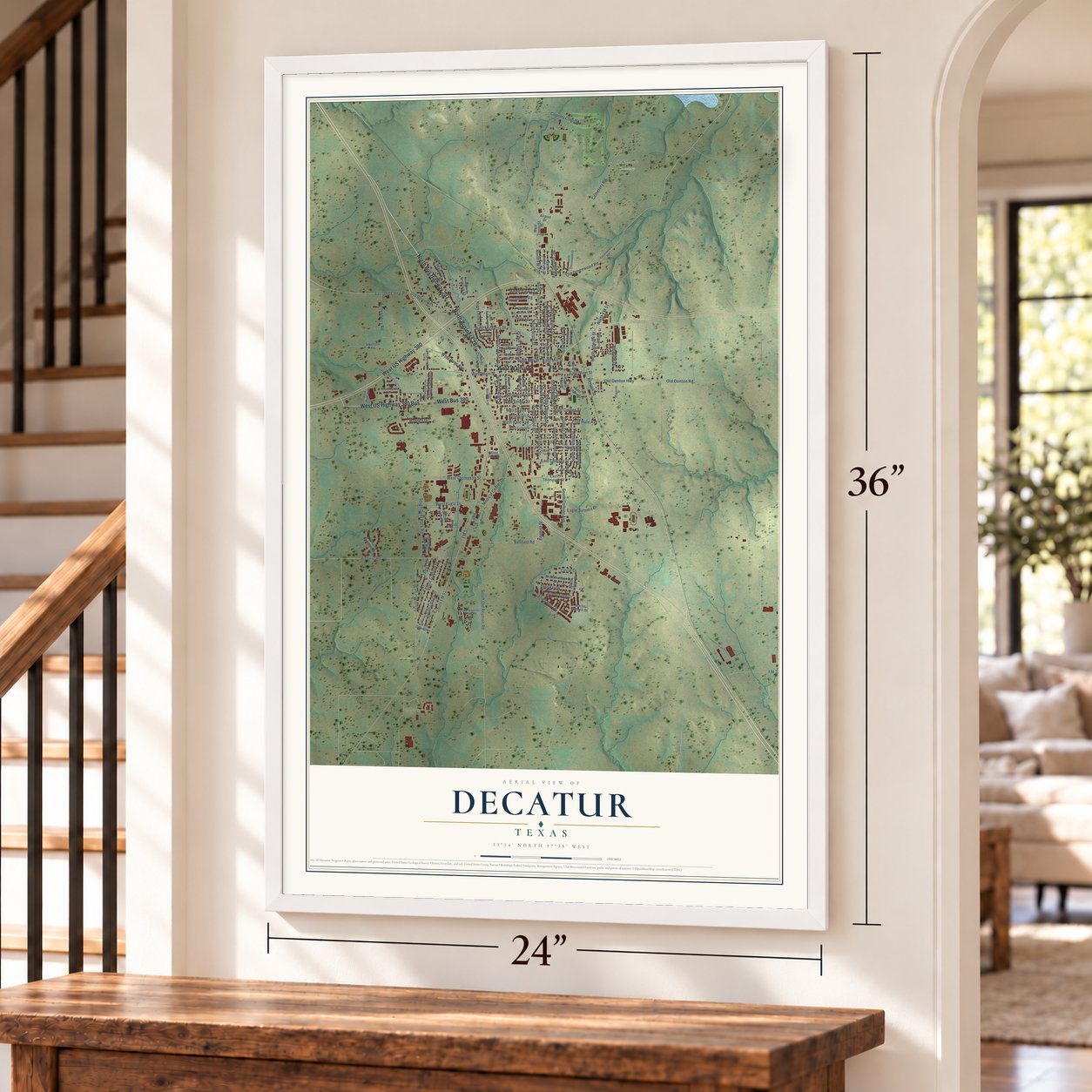 Decatur, Texas map, 24 x 36 inch print in a white frame by a staircase