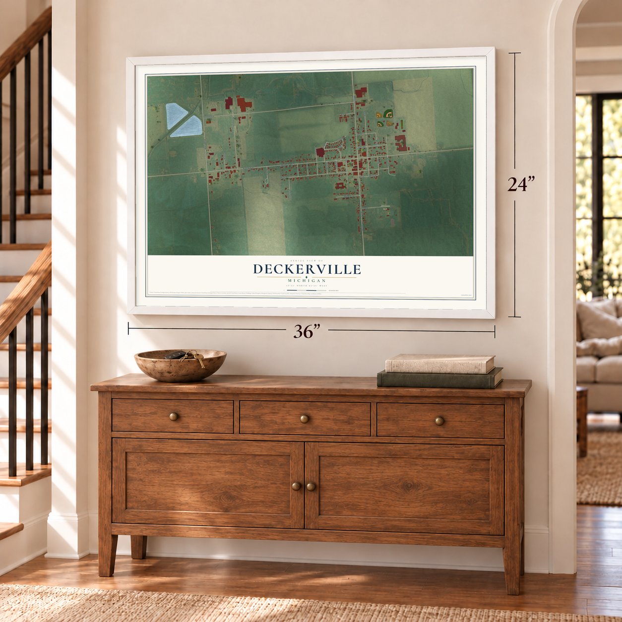 Deckerville, Michigan map, 24 x 36 inch print in a white frame above a dresser by a staircase