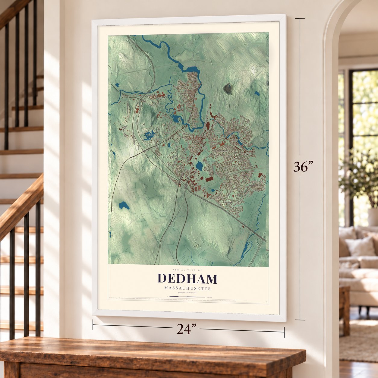 Dedham, Massachusetts map, 24 x 36 inch print in a white frame by a staircase