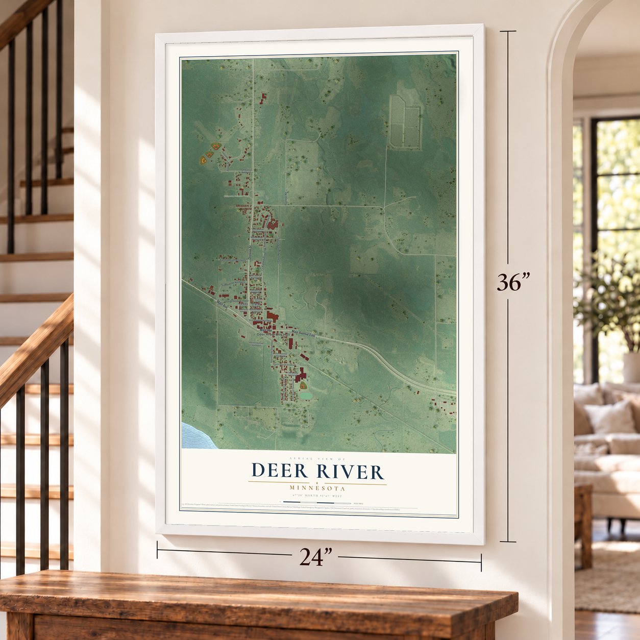 Deer River, Minnesota map, 24 x 36 inch print in a white frame by a staircase