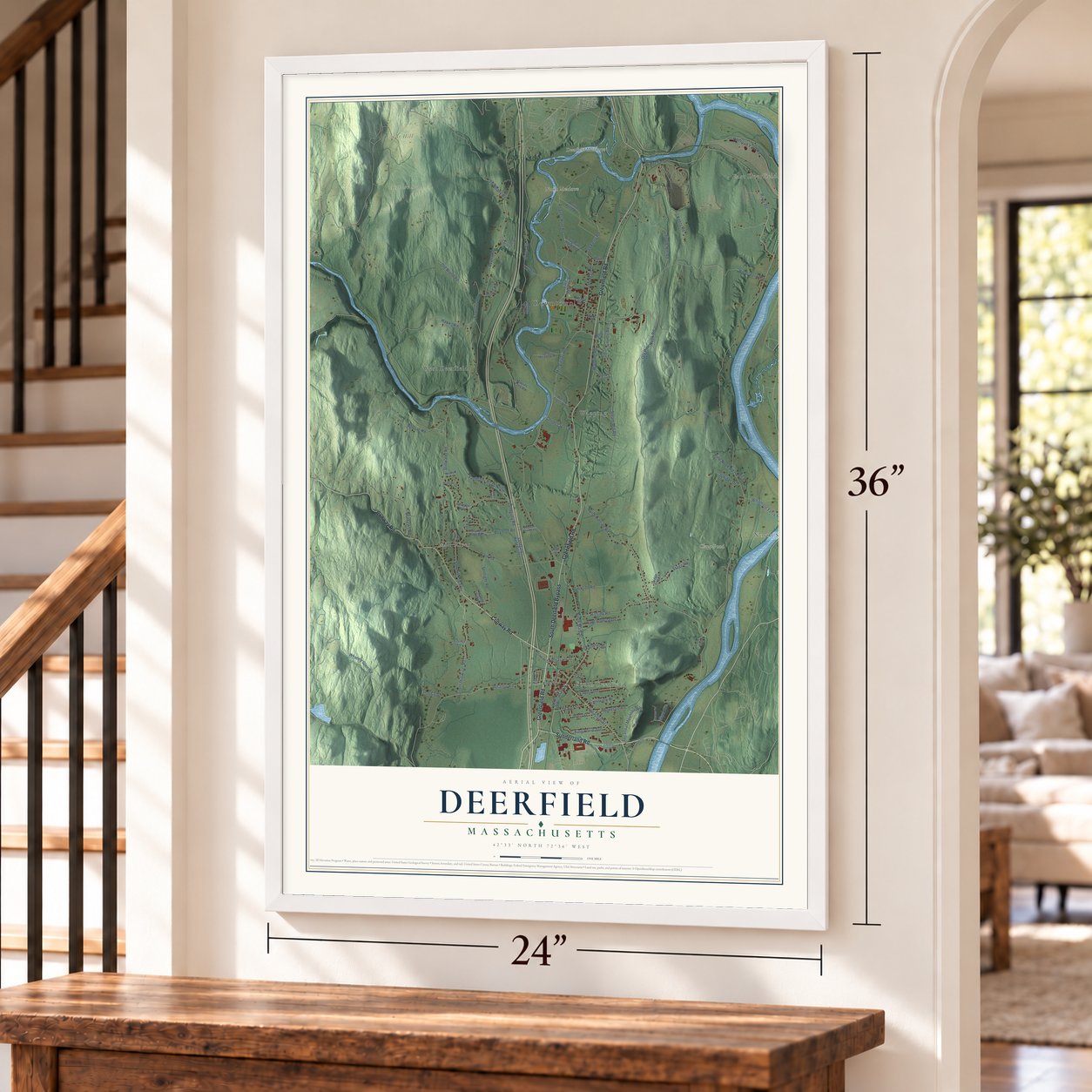 Deerfield, Massachusetts map, 24 x 36 inch print in a white frame by a staircase