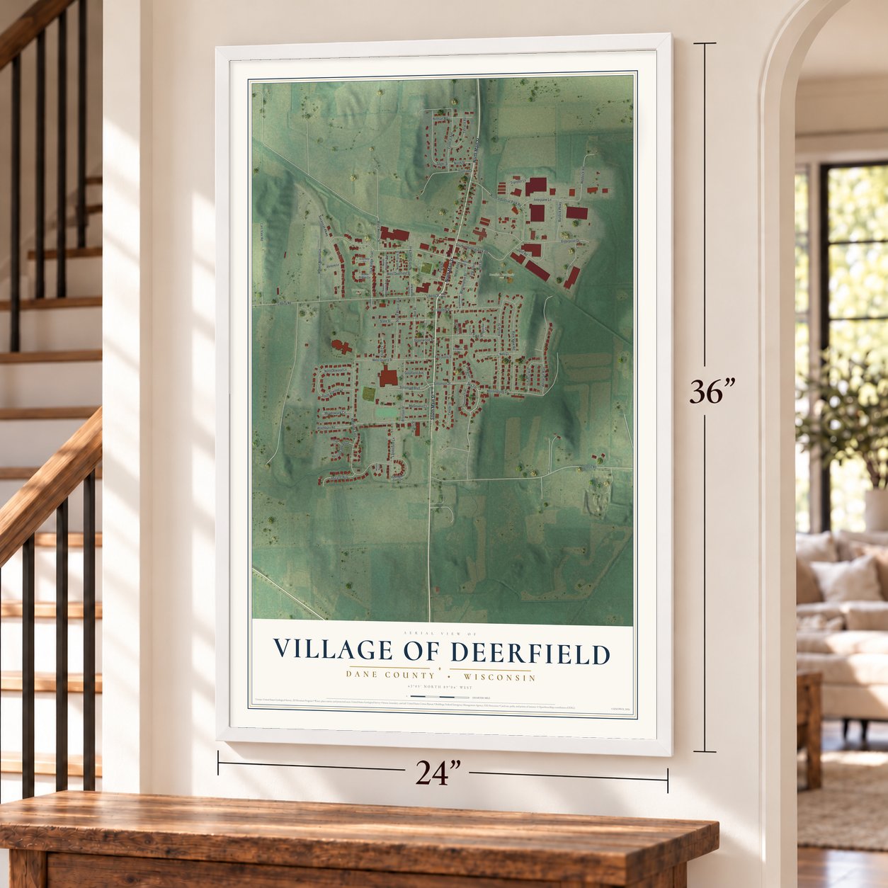Deerfield, Wisconsin map, 24 x 36 inch print in a white frame by a staircase