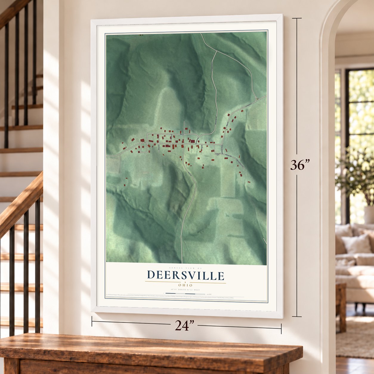 Deersville, Ohio map, 24 x 36 inch print in a white frame by a staircase