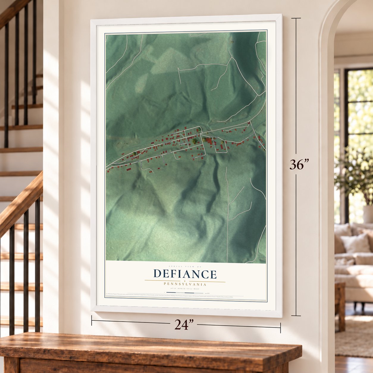 Defiance, Pennsylvania map, 24 x 36 inch print in a white frame by a staircase