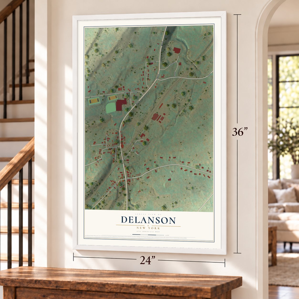 Delanson, New York map, 24 x 36 inch print in a white frame by a staircase