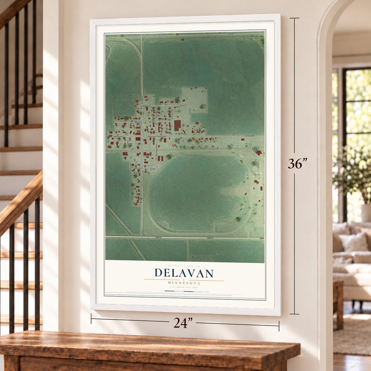 Delavan, Minnesota map, 24 x 36 inch print in a white frame by a staircase