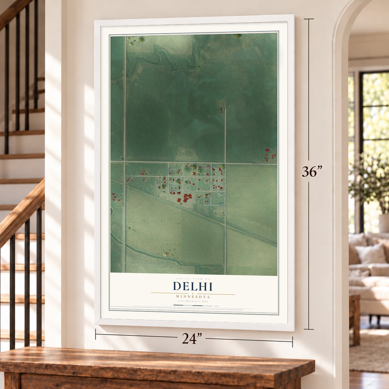 Delhi, Minnesota map, 24 x 36 inch print in a white frame by a staircase