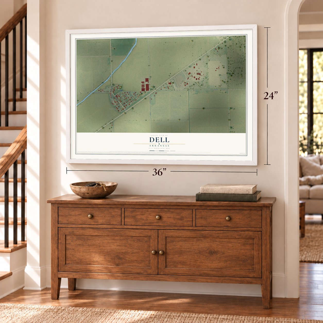 Dell, Arkansas map, 24 x 36 inch print in a white frame above a dresser by a staircase