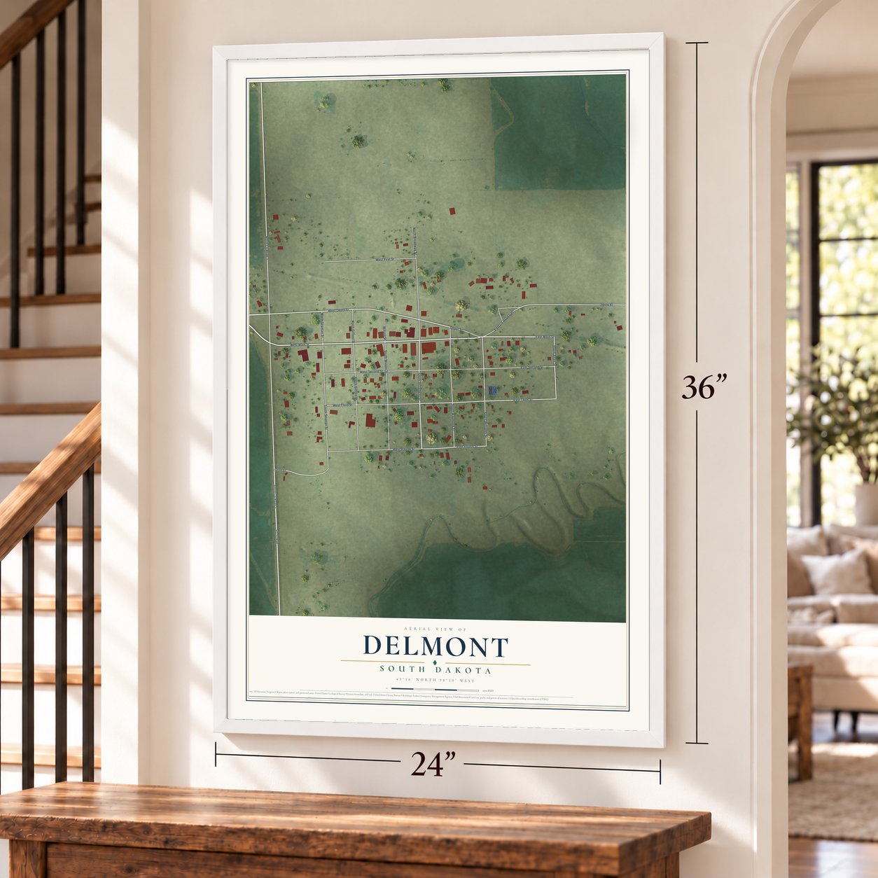 Delmont, South Dakota map, 24 x 36 inch print in a white frame by a staircase