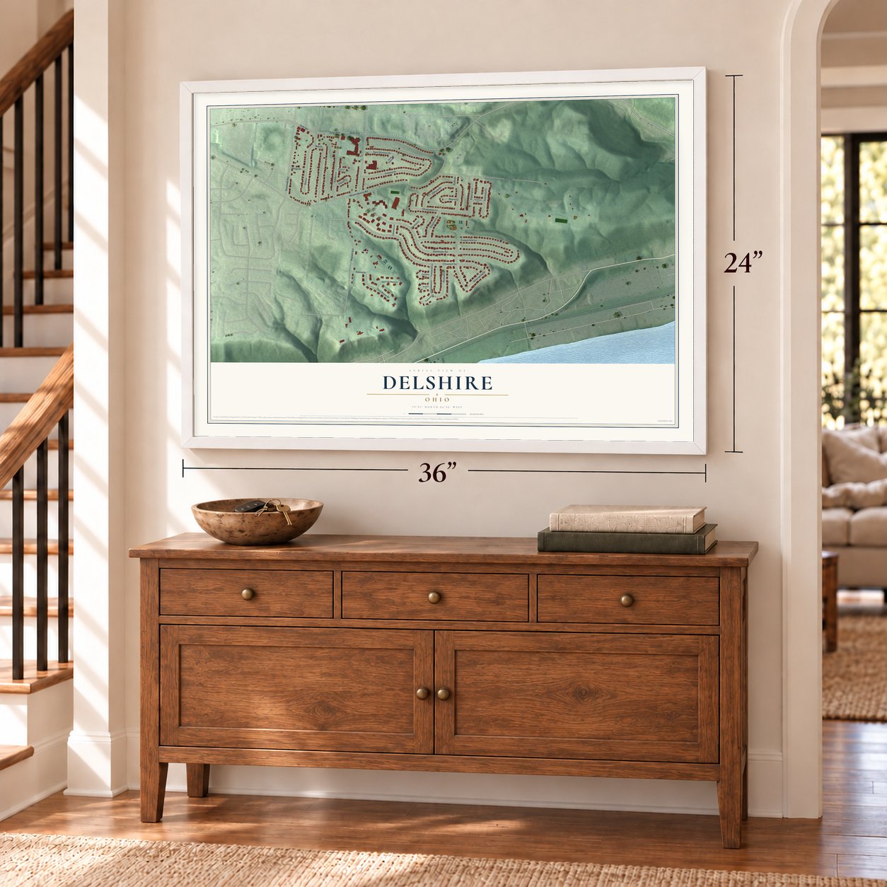 Delshire, Ohio map, 24 x 36 inch print in a white frame above a dresser by a staircase