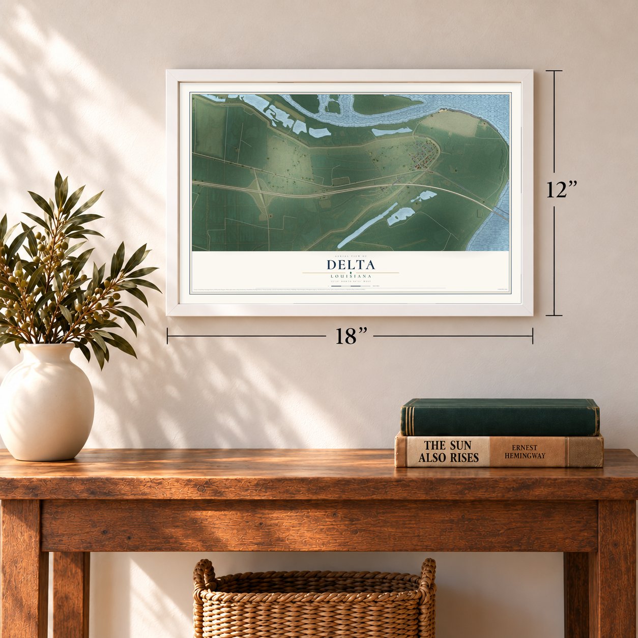 Delta, Louisiana map, 12 x 18 inch print in a white frame in an entryway