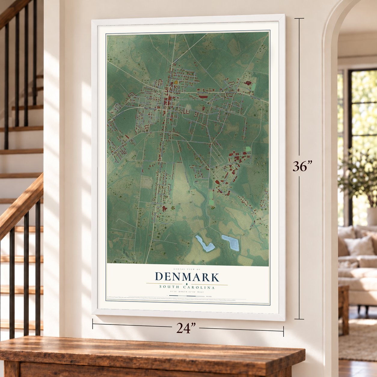 Denmark, South Carolina map, 24 x 36 inch print in a white frame by a staircase