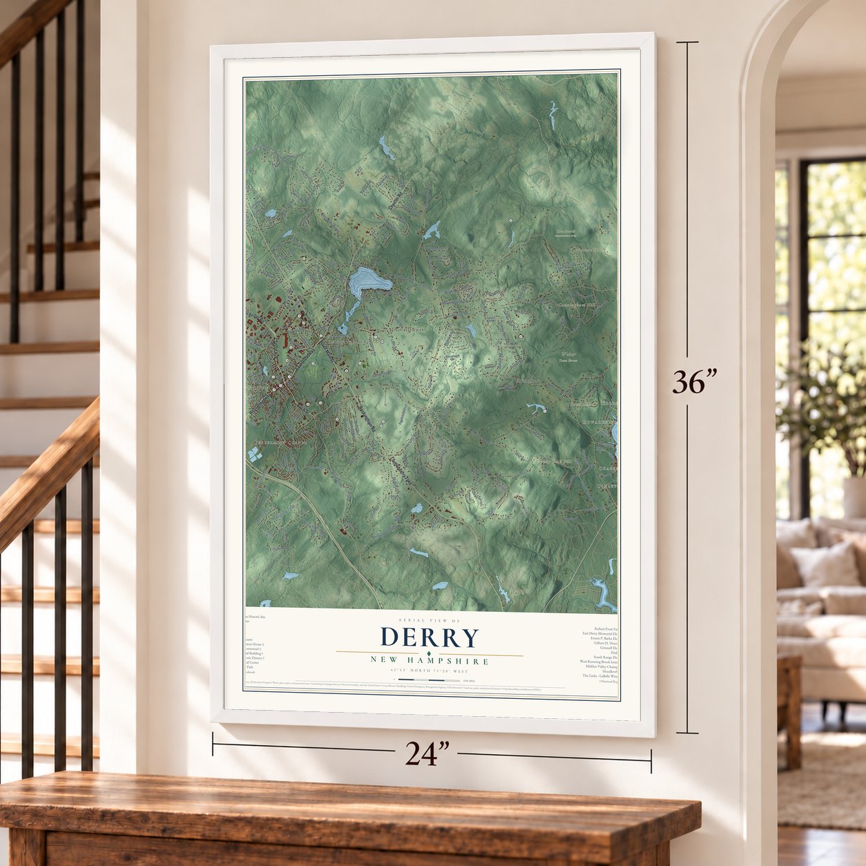 Derry, New Hampshire map, 24 x 36 inch print in a white frame by a staircase