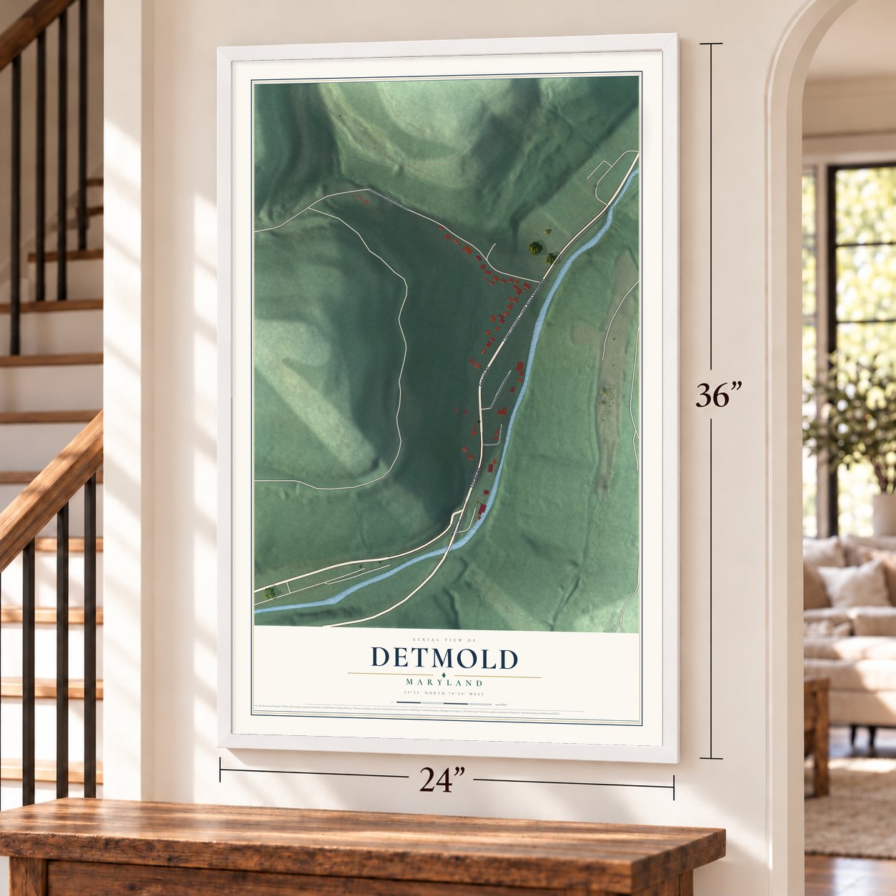 Detmold, Maryland map, 24 x 36 inch print in a white frame by a staircase