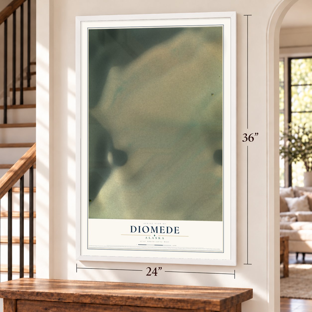 Diomede, Alaska map, 24 x 36 inch print in a white frame by a staircase