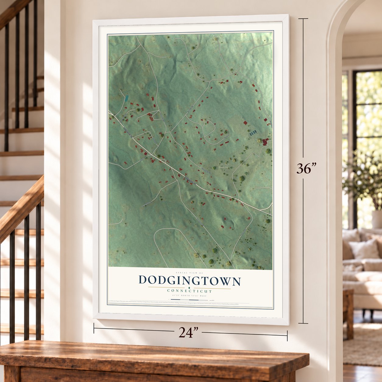 Dodgingtown, Connecticut map, 24 x 36 inch print in a white frame by a staircase