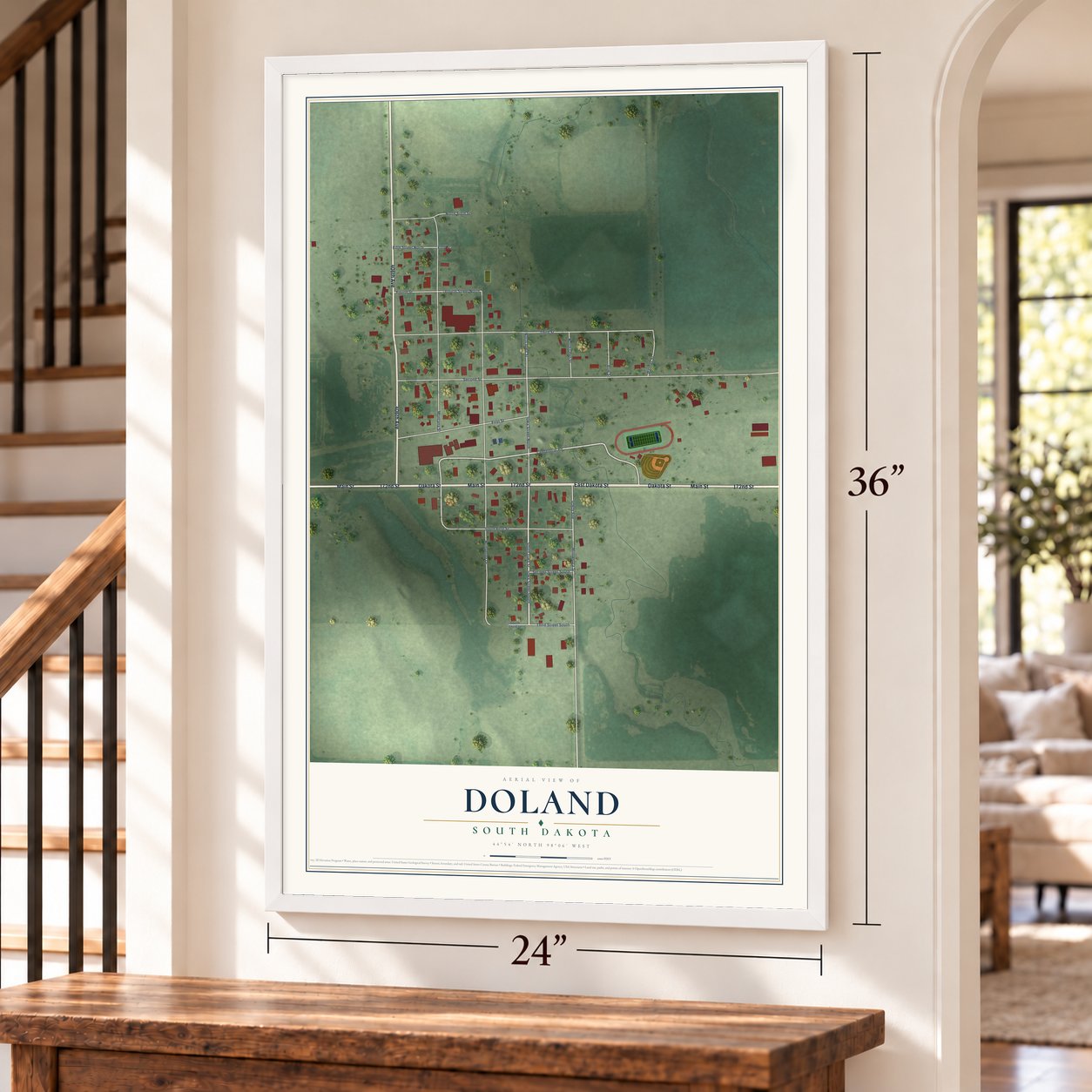 Doland, South Dakota map, 24 x 36 inch print in a white frame by a staircase