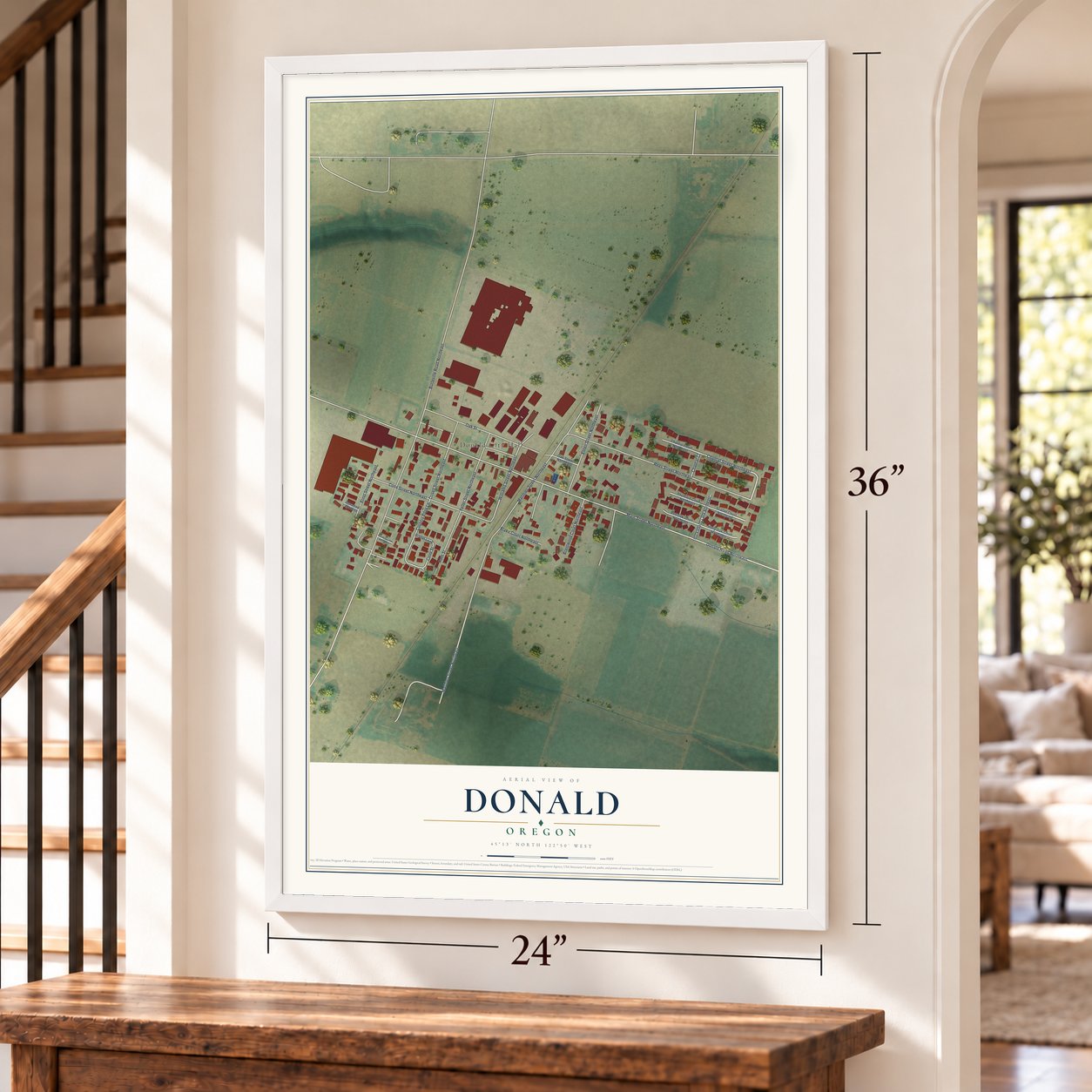 Donald, Oregon map, 24 x 36 inch print in a white frame by a staircase