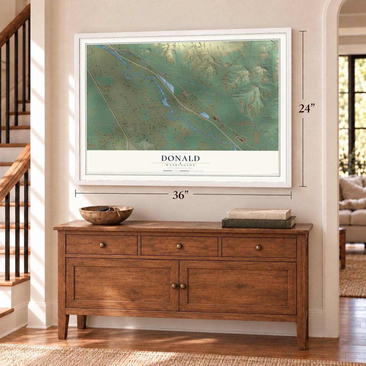 Donald, Washington map, 24 x 36 inch print in a white frame above a dresser by a staircase