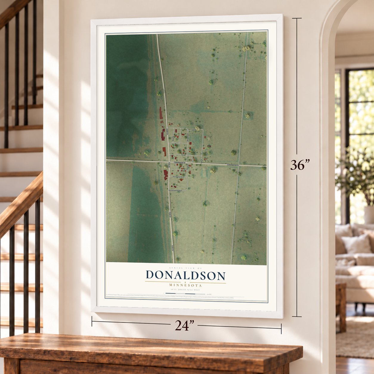 Donaldson, Minnesota map, 24 x 36 inch print in a white frame by a staircase