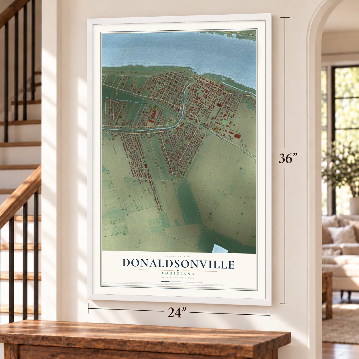 Donaldsonville, Louisiana map, 24 x 36 inch print in a white frame by a staircase