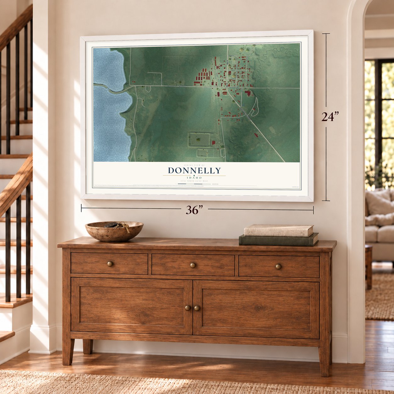 Donnelly, Idaho map, 24 x 36 inch print in a white frame above a dresser by a staircase