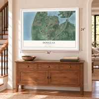 Douglas, Michigan map, 24 x 36 inch print in a white frame above a dresser by a staircase