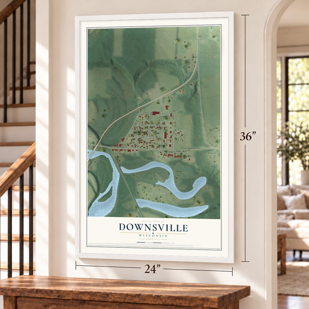 Downsville, Wisconsin map, 24 x 36 inch print in a white frame by a staircase