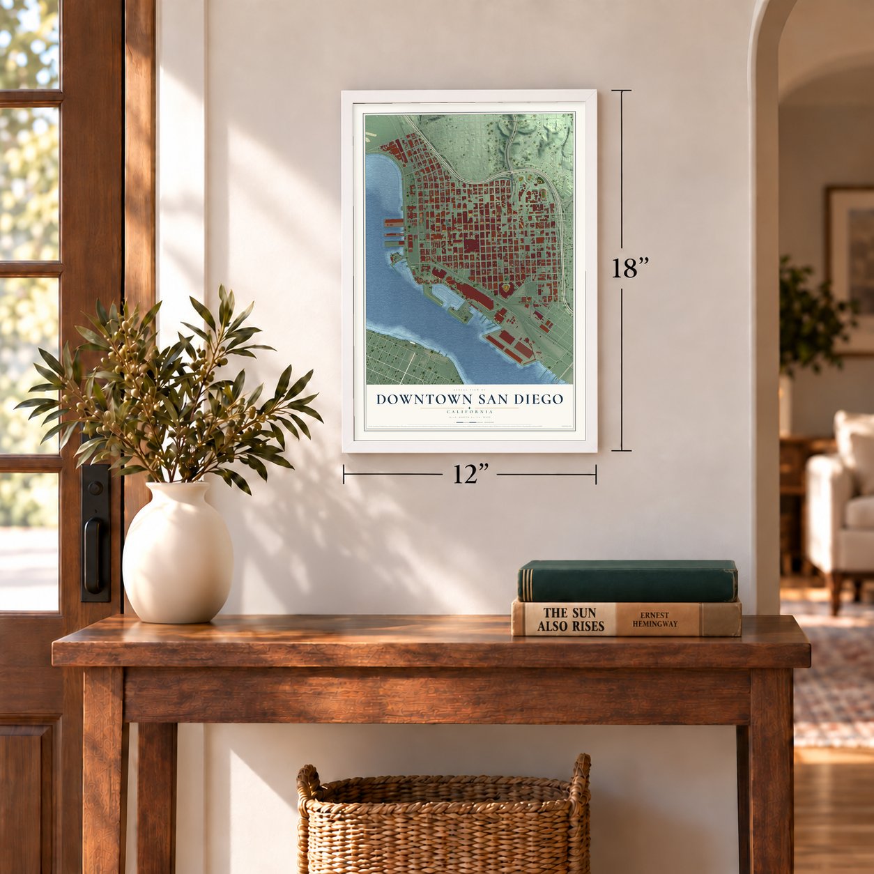 Downtown San Diego, California map, 12 x 18 inch print in a white frame in an entryway