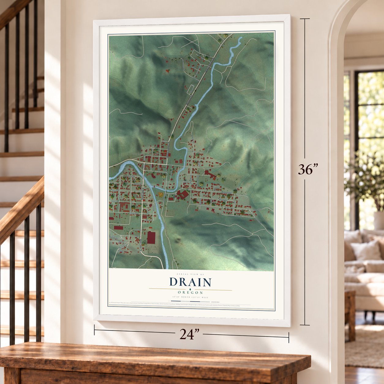 Drain, Oregon map, 24 x 36 inch print in a white frame by a staircase