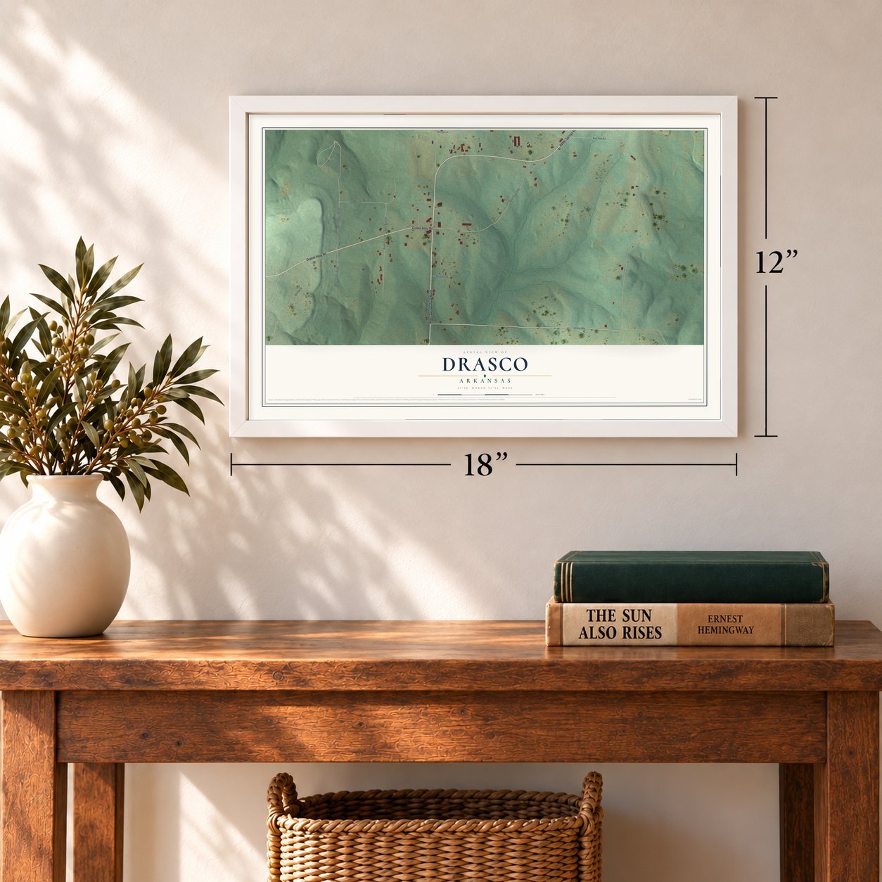 Drasco, Arkansas map, 12 x 18 inch print in a white frame in an entryway