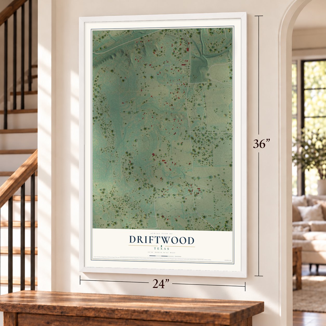Driftwood, Texas map, 24 x 36 inch print in a white frame by a staircase