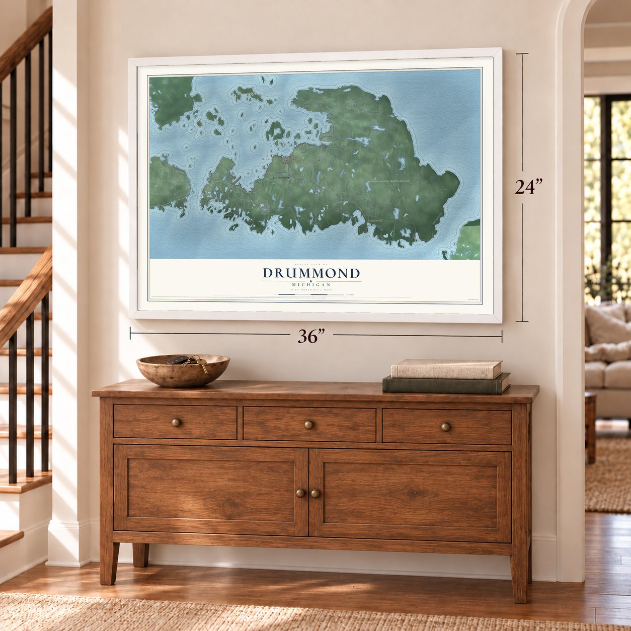 Drummond, Michigan map, 24 x 36 inch print in a white frame above a dresser by a staircase