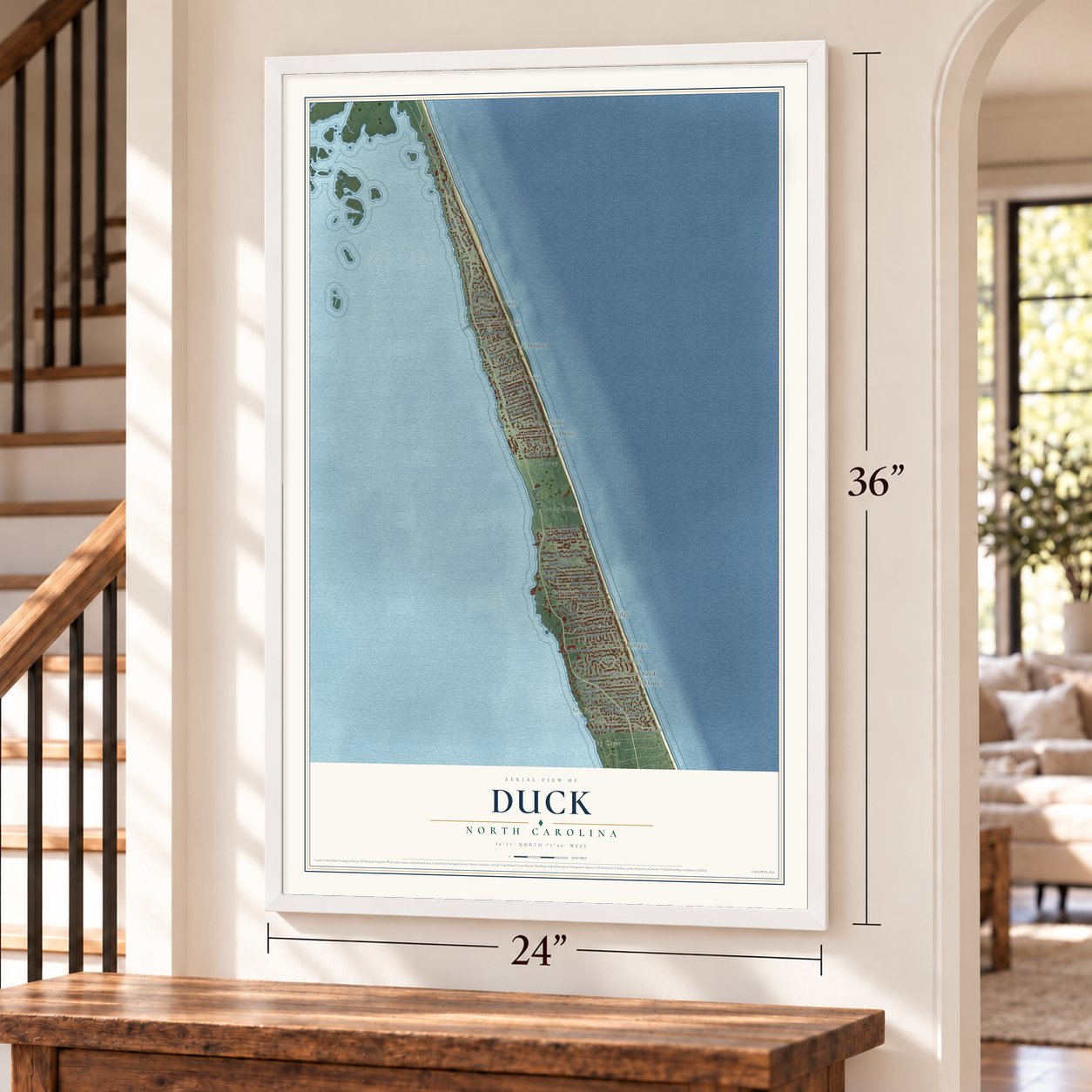 Duck, North Carolina map, 24 x 36 inch print in a white frame by a staircase