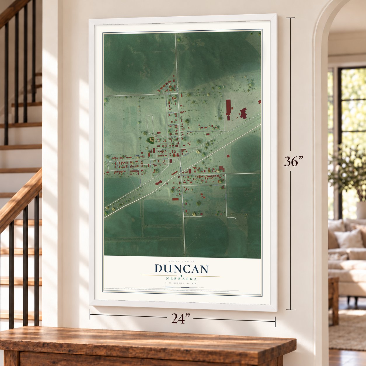 Duncan, Nebraska map, 24 x 36 inch print in a white frame by a staircase